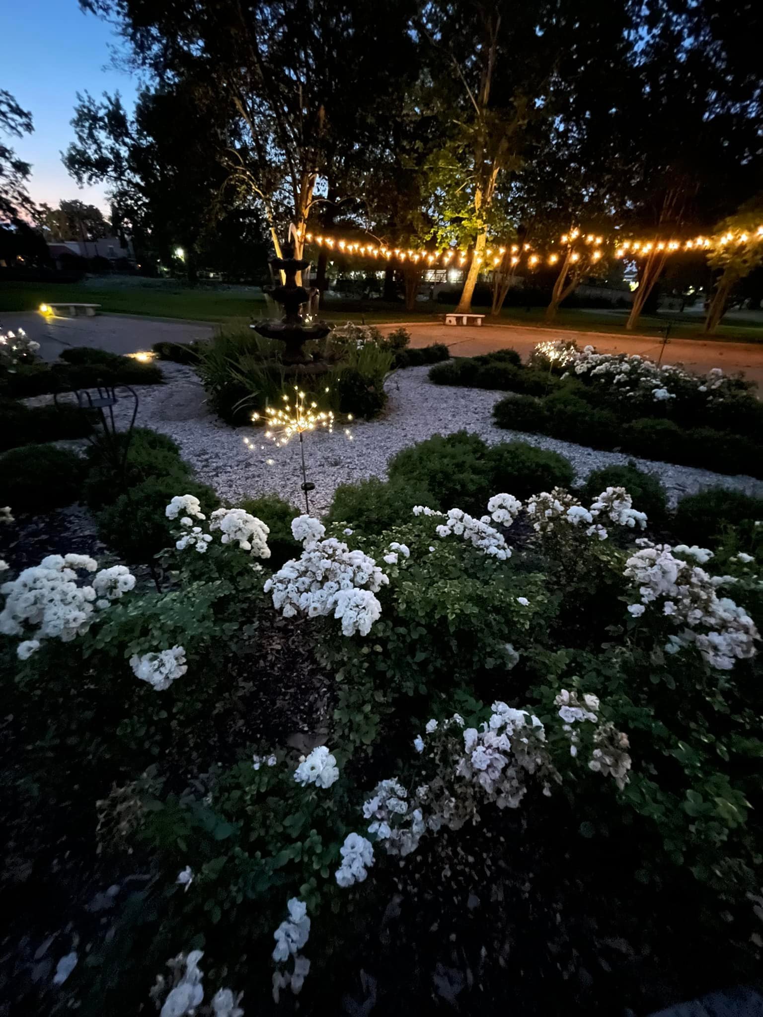 Crawford House at Night front circle flowers