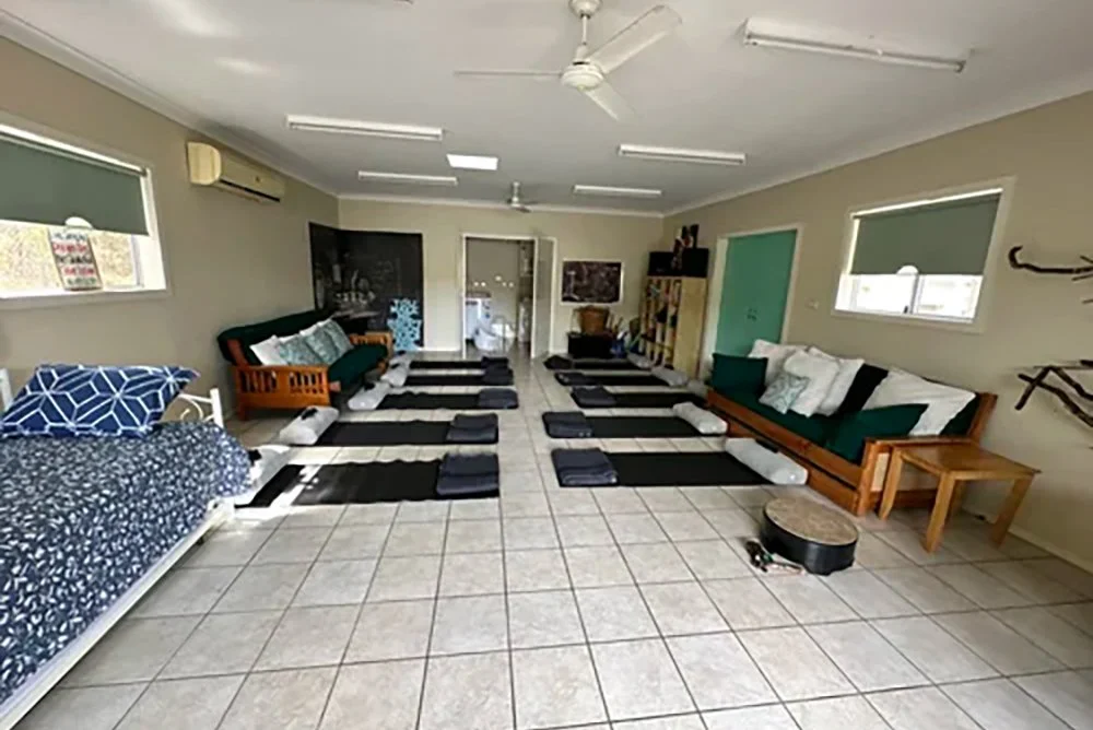 Large tiled multi-purpose room for games or to set up for meditations, or break-away purposes.