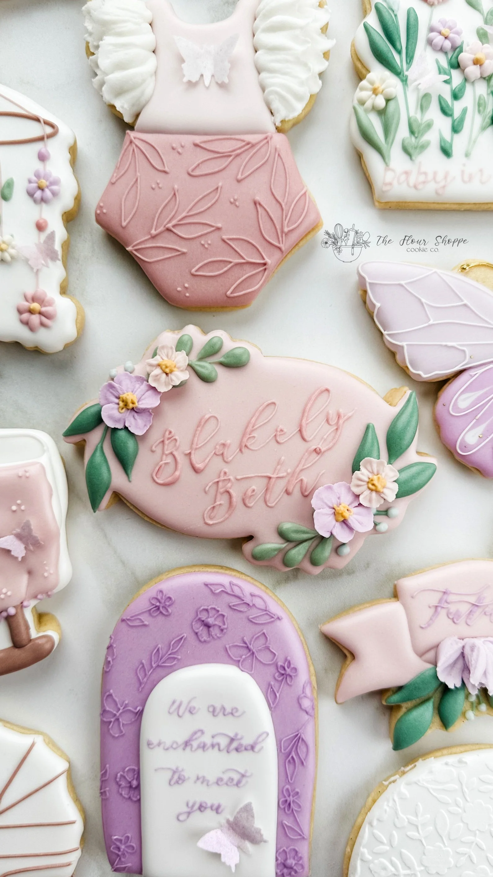 Baby in Bloom, We're Enchanted to Meet You Floral and Butterfly Baby Shower Cookies. Pastel Spring Baby Girl Cookies Royal Icing Decorated Sugar Cookies The Flour Shoppe Cookie Co Omaha, NE29.jpg