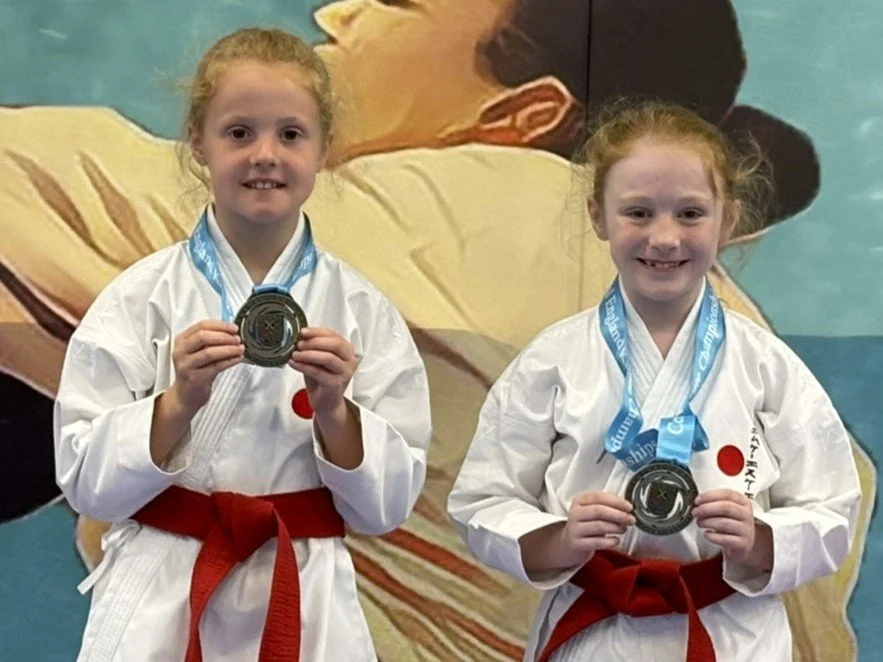 Lexi & Bella medal.JPEG