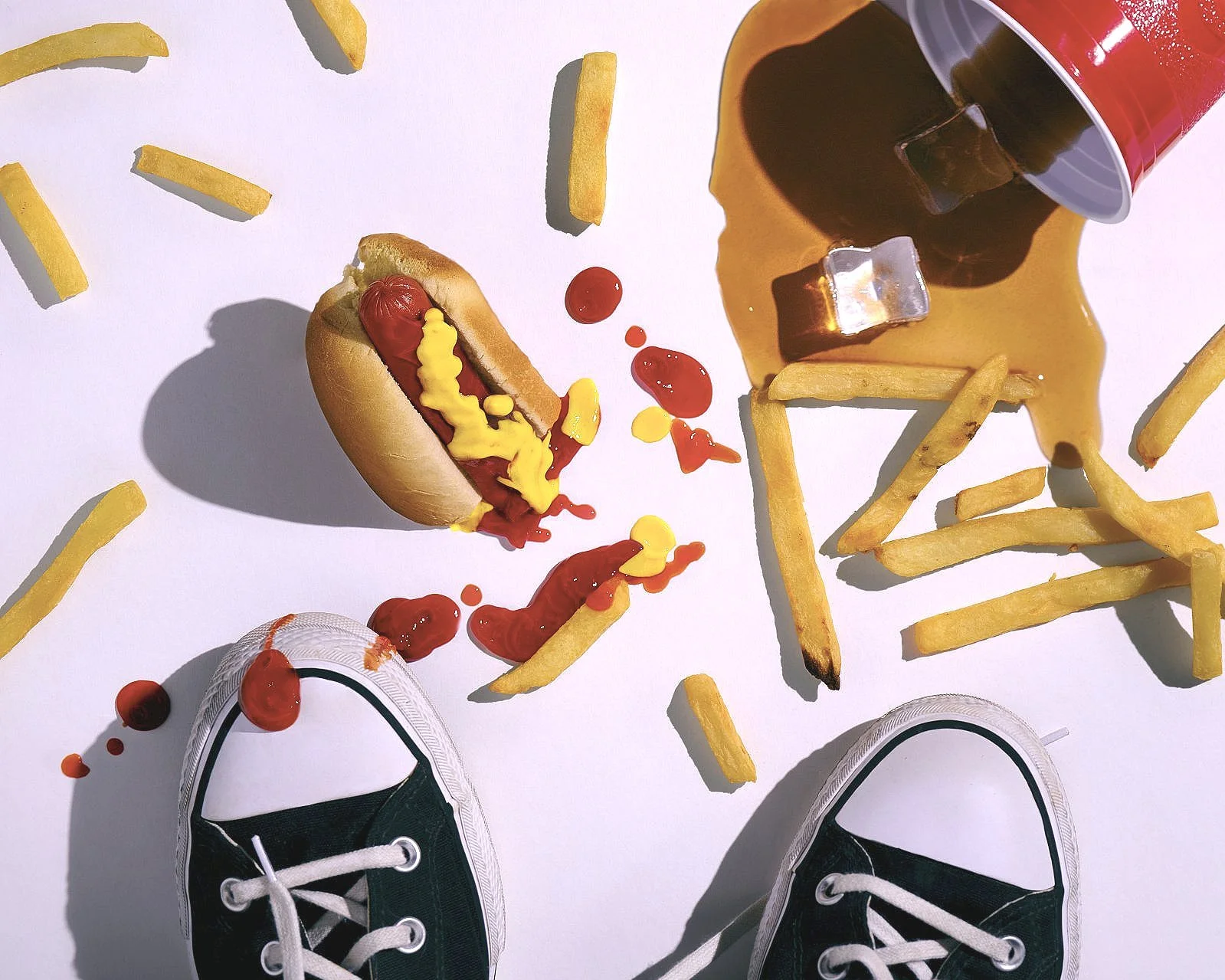 Hotdog+and+Fries+on+Floor+with+Converse+-+James+Robertson+-+Commercial+Food+Photographer+in+Oklahoma.jpg