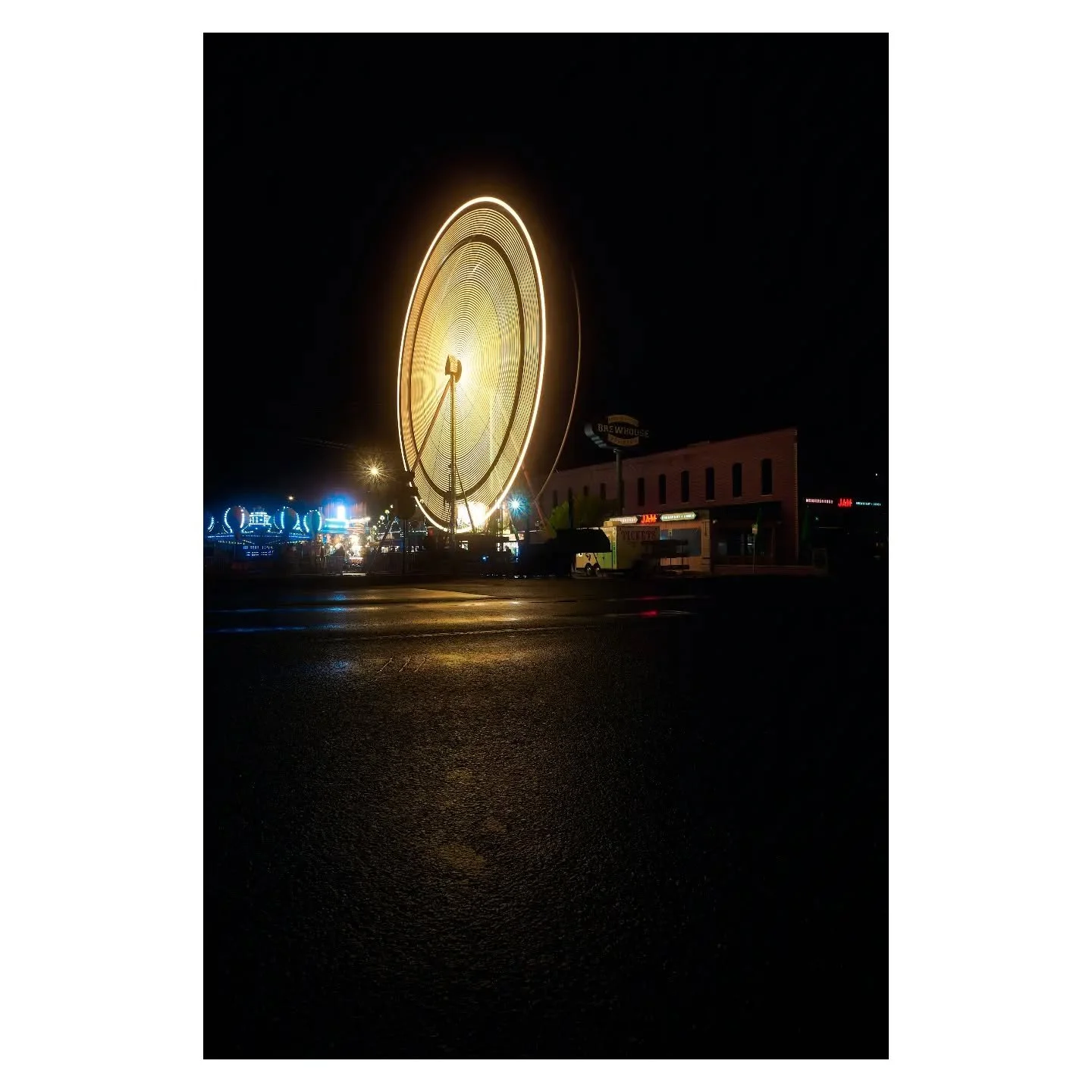 Rainy weather ferris wheel lights at @normanmusicfestival '23. 

#ferriswheel #rainyday #eventphotography #musicfestival #rainphotography