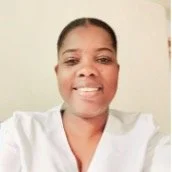 Louna Saint Cyr is the head nurse of the Emmaus Clinic. She graduated in nursing from the Université Notre Dame d'Haiti.