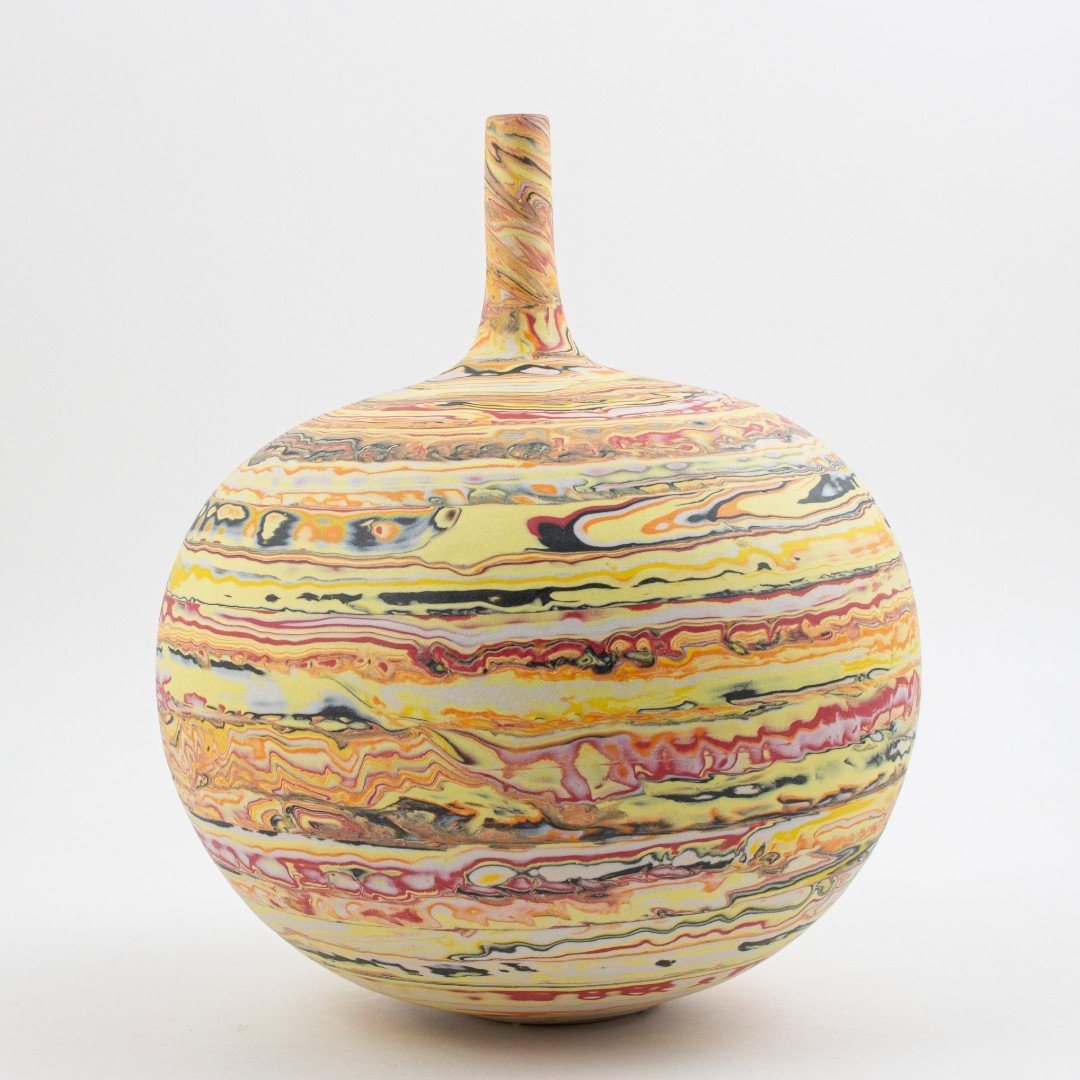 Inspired by the intricate layers of rock strata, David Barnes ( @eversfield_ceramics ) uses coils of different colours of clay which are then combined during the throwing process to create a marbled affect.

Check out our online shop or visit us in o