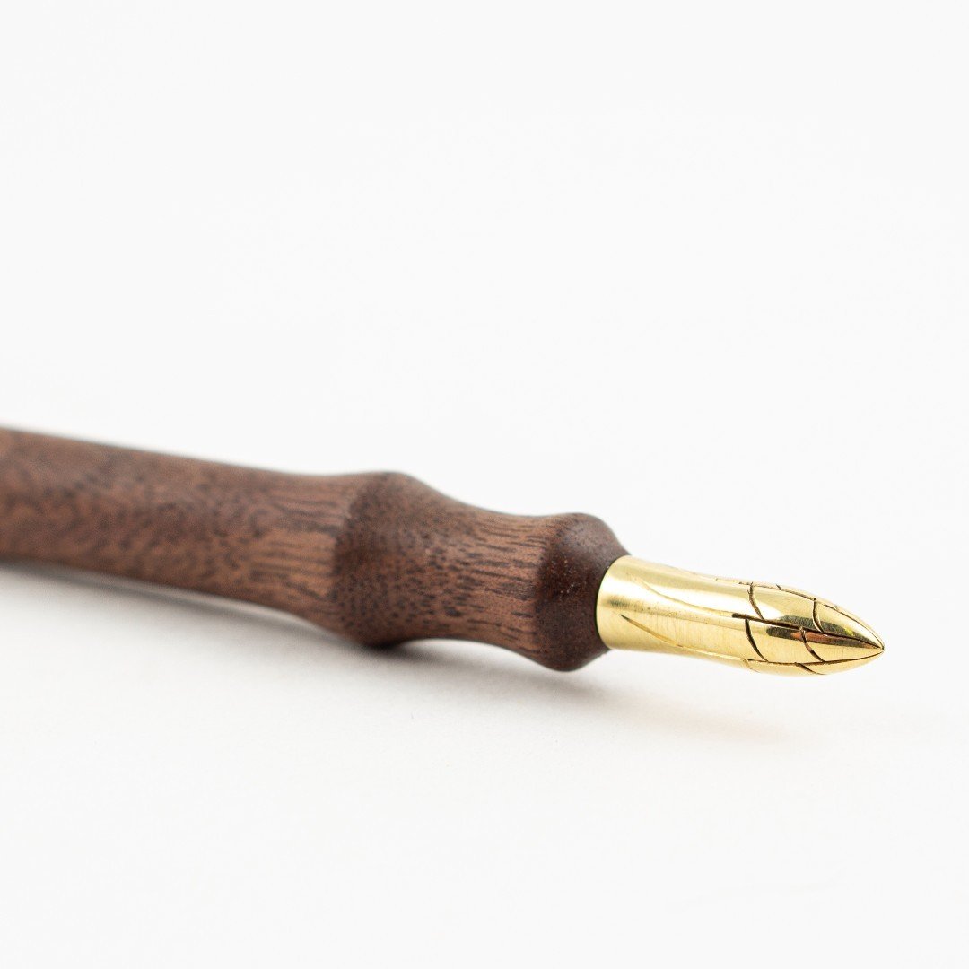 An essential for an aspiring or practiced calligrapher, Luke Weiser's ( @luke_weiser ) dip pen would make a handsome addition to any writer's collection. The turned walnut handle and handmade tip make for a lightweight, comfortable tool that fits wel