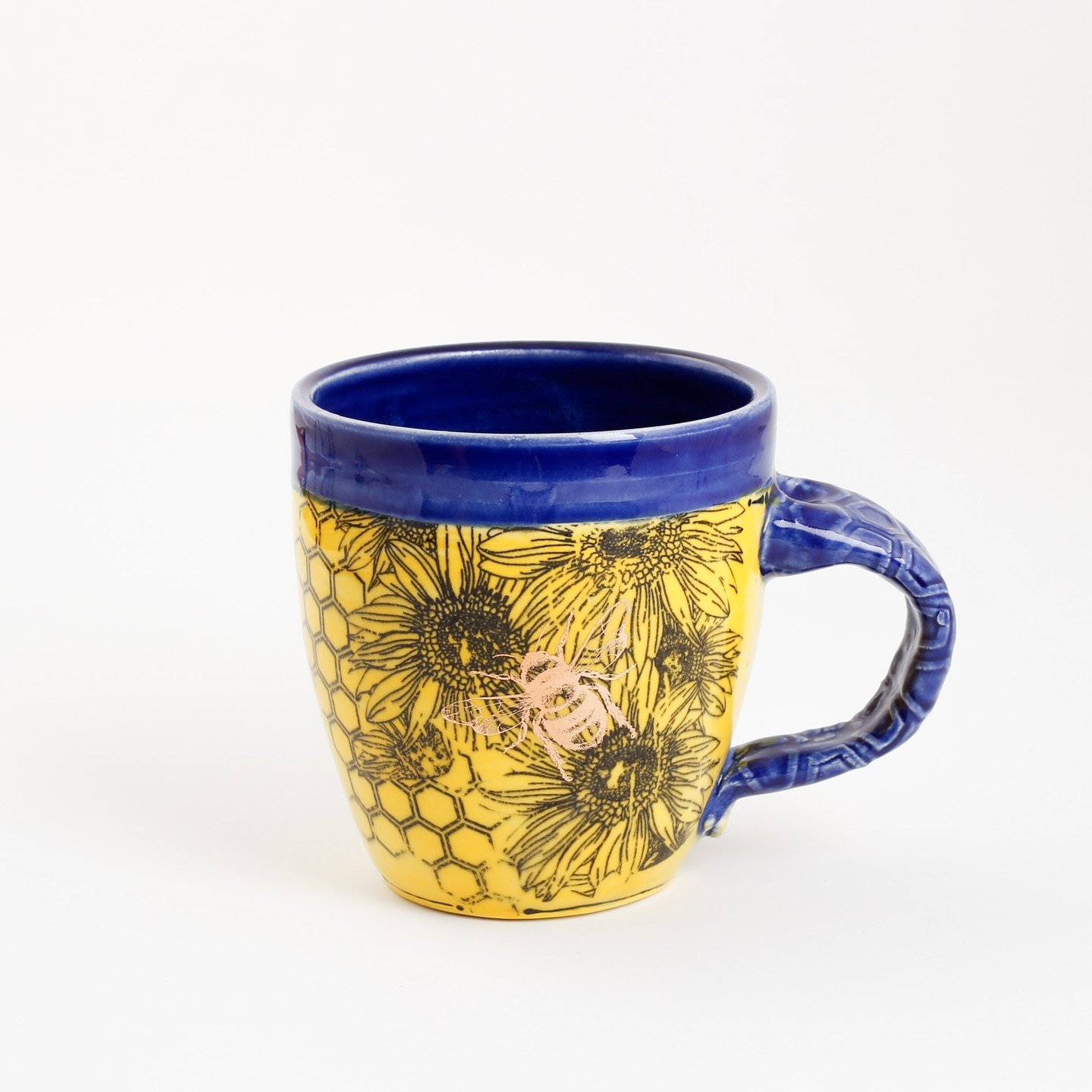 🐝🐝🌻🌻Check out these new colour-ways by Tammy Parks-Legge! Hidden in these new mugs are golden bees on robust vivid sunflowers 🐝🐝🌻🌻

&quot;As a utilitarian clay artist she works diligently to produce pieces that are highly functional in use bu