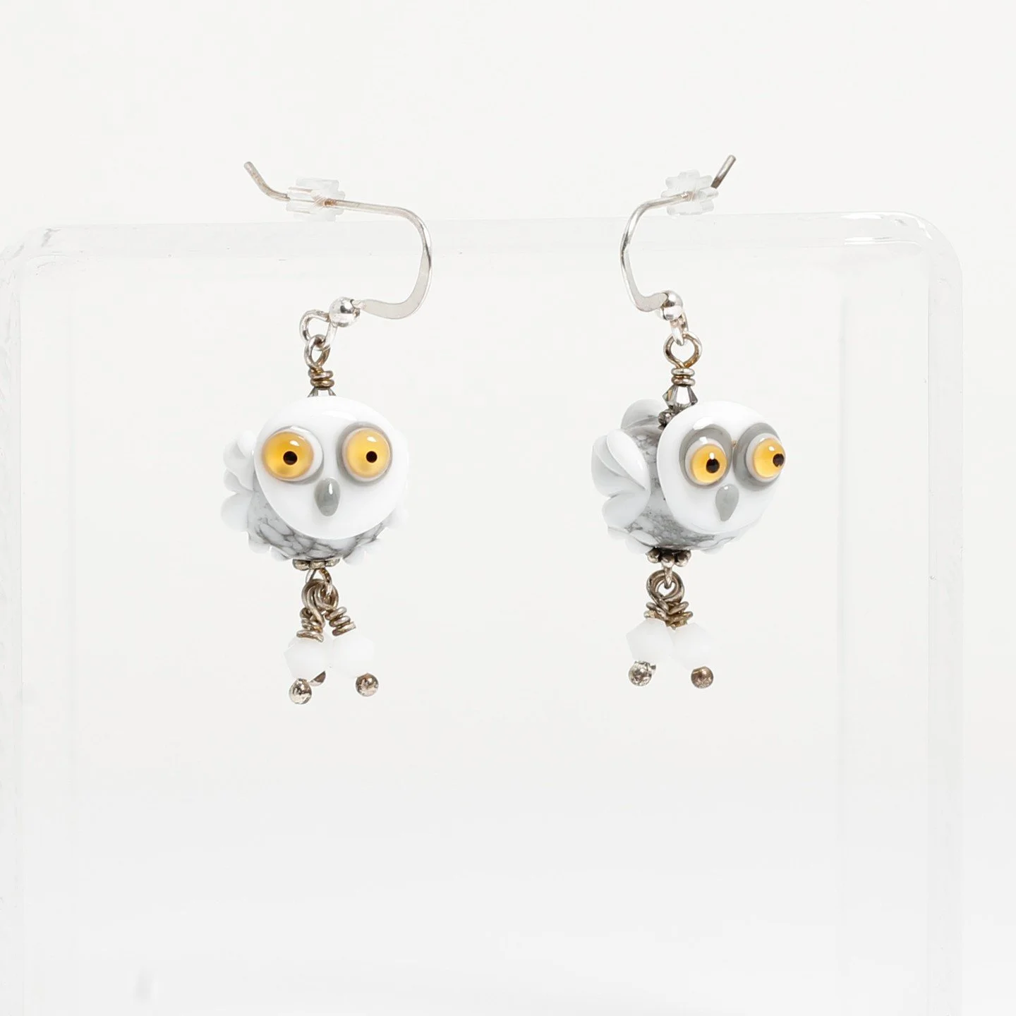 Have you popped onto the Alberta Craft online shop recently? We have the cutest Birds of a Feather feature page showcasing all the feathery friends our artists are showcasing. Here we have  delightful glass bead earrings and lapel pins of owls and ch