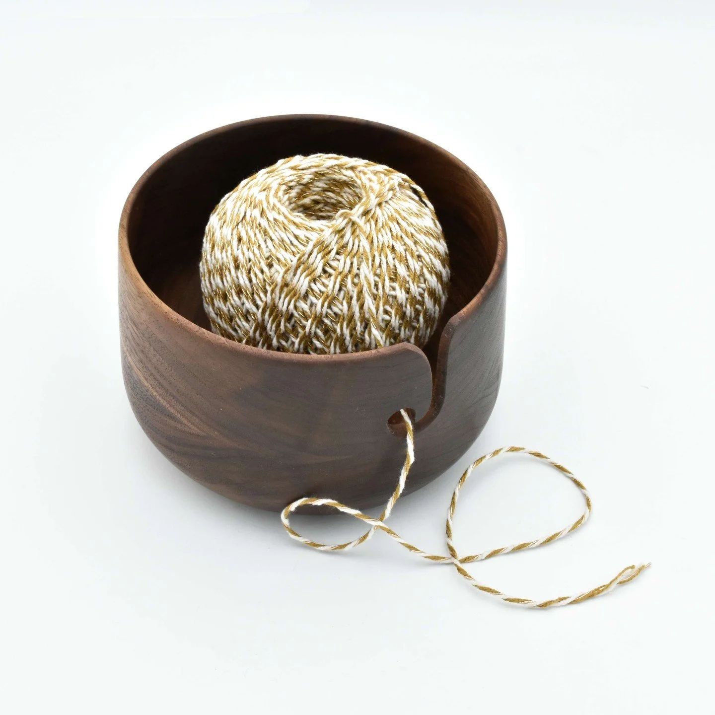 Calling all yarn lovers! 🧶 Helen Mawdsley&rsquo;s walnut wood yarn bowl is here to make your crafting sessions smoother than ever. The hand-carved scroll lets your yarn glide with ease&mdash;perfect for knitting, crochet, or any creative adventure.
