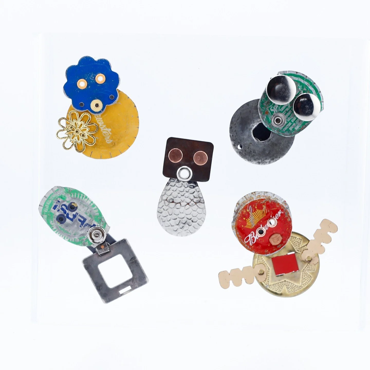 Meet Saffron, Rocket, Marlow, Bug Eyed, and many more friends by Susanah Windrum! These metal character brooches are filled with personality and charm (and come with magnetic backings to fasten to your garments). Take a peak online at all of Susanah'