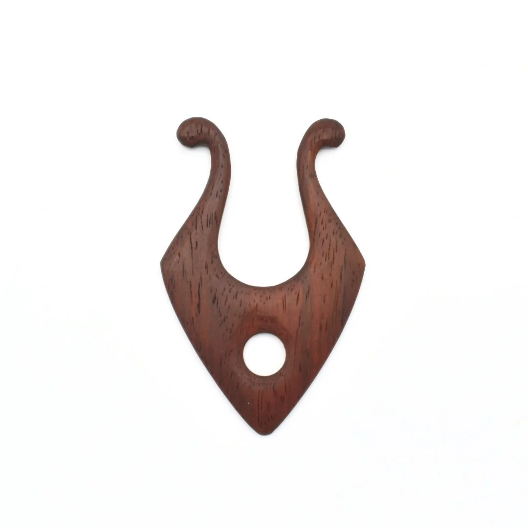 Ever heard of a lucet? 

A lucet is a small, fork-shaped tool used for cord-making&mdash;a technique that dates back centuries. With just a bit of yarn and a simple looping method, it creates strong, square cords that don&rsquo;t unravel easily. Thes