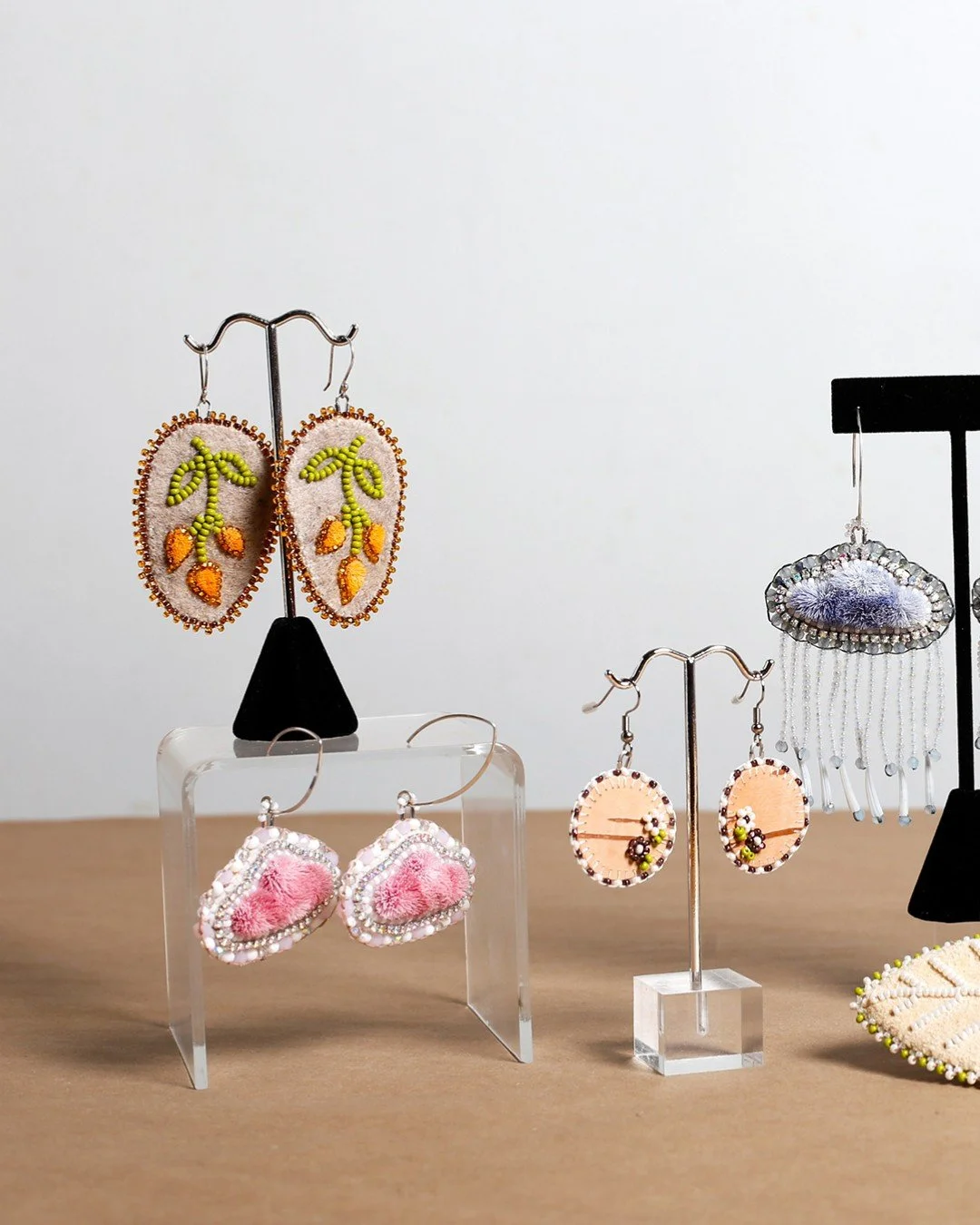 Say goodbye to the dreary grey days of winter with these jubilant earrings by Tralynn Ganter! Birchbark backed tufted flowers, caribou tufted clouds, beaded florals, Tralynns&rsquo; work is a colourful breath of fresh air, and we&rsquo;re excited to 