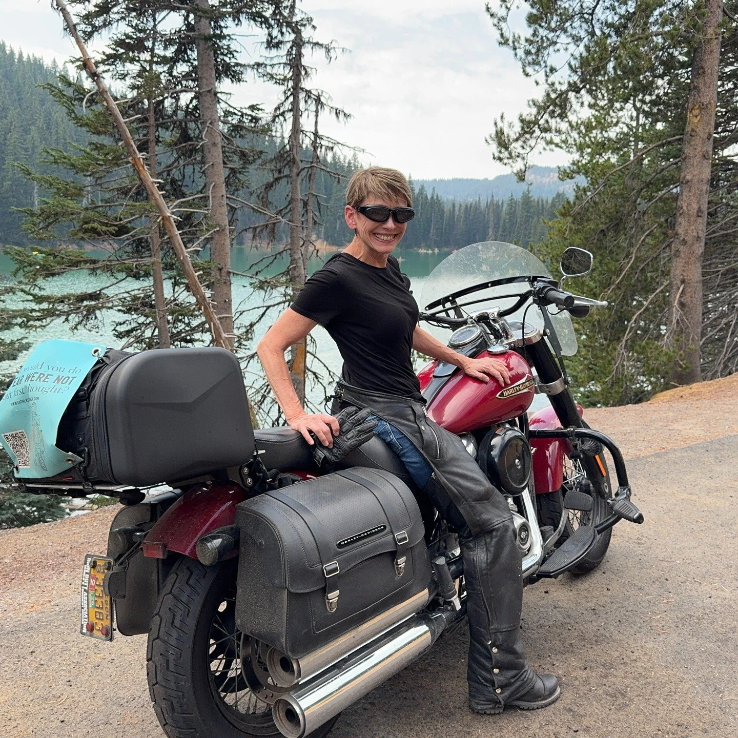 Giddy with delight, I swooped left and right on the curves of the Cascade Lake Scenic Highway, barreling past shoulders of deep red volcanic ash at the base of snow-covered mountain peaks on both sides. Riding through lush evergreen forests and spark