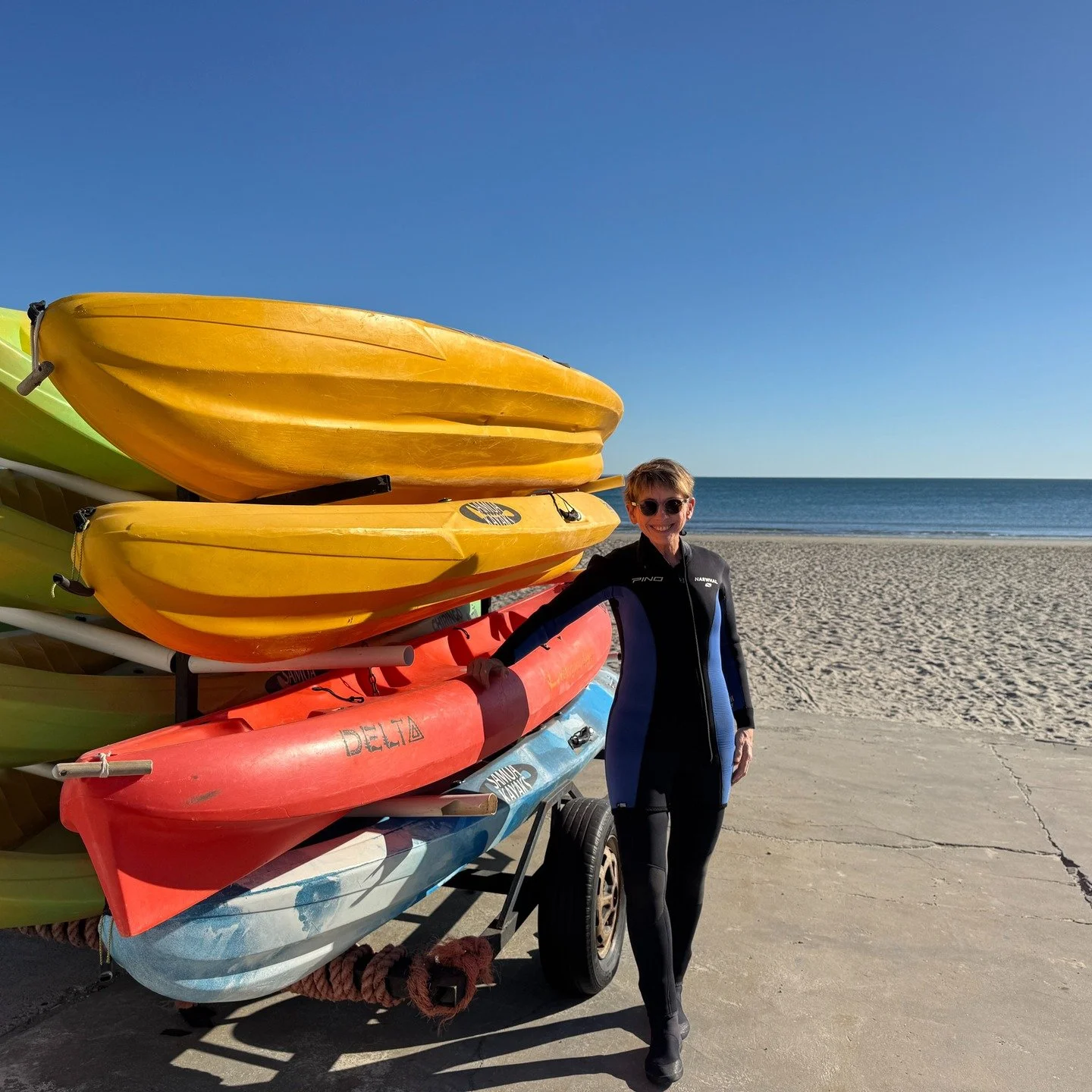 As the slick, dense, wet fur of the South American Sea Lions slid under my hand in the choppy waters off the Punta Loma Provincial Reserve, my eyes watered with joy inside my scuba mask. When I first made plans to ride south on my motorcycle from Bue