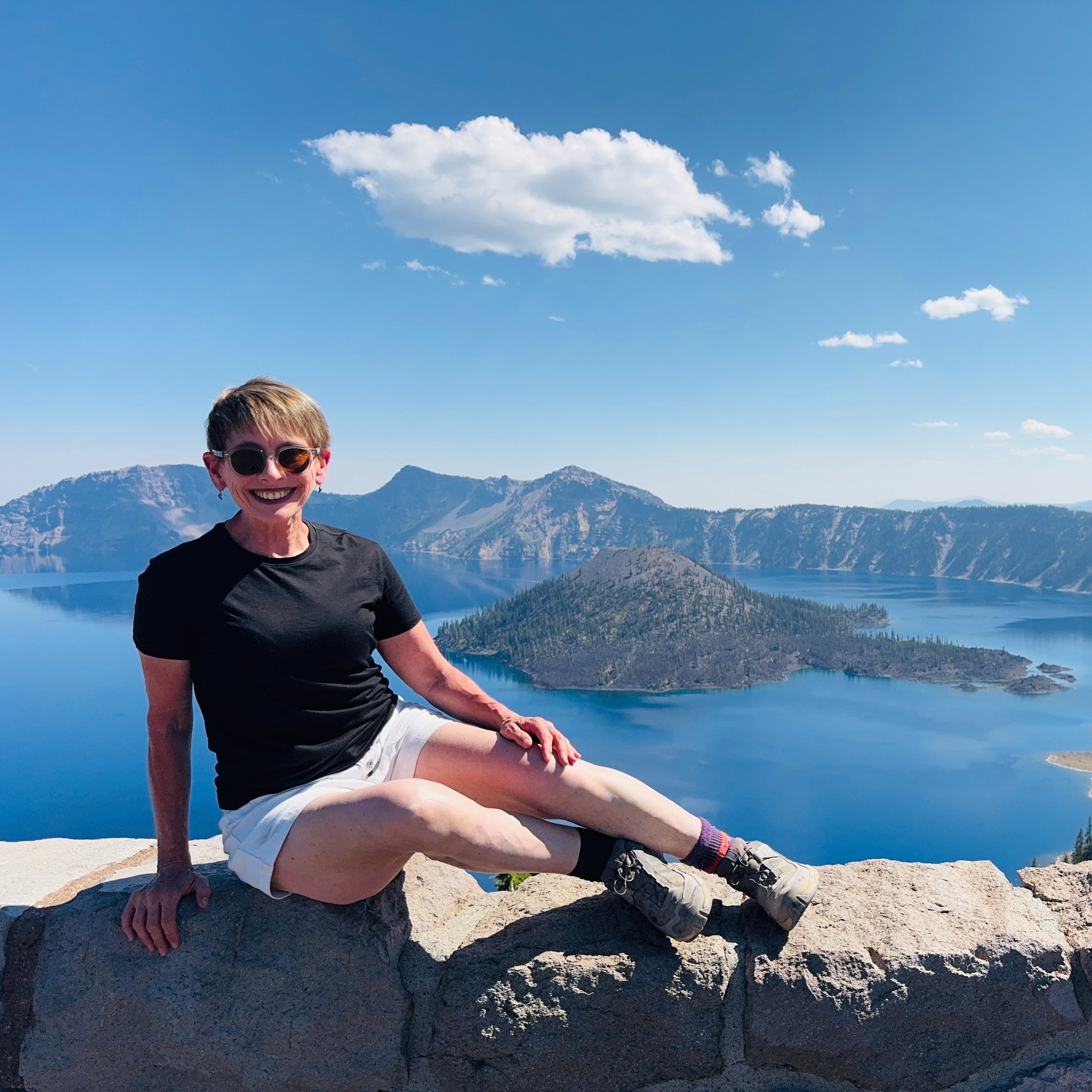 Pulling up to the southern end of Crater Lake and parking at the Sinnott Memorial Observation Station, I gazed out at the bold, brilliant, blue waters in wonder, marveling at the stark contrast the pop of color made against the dusty light-tan dirt o