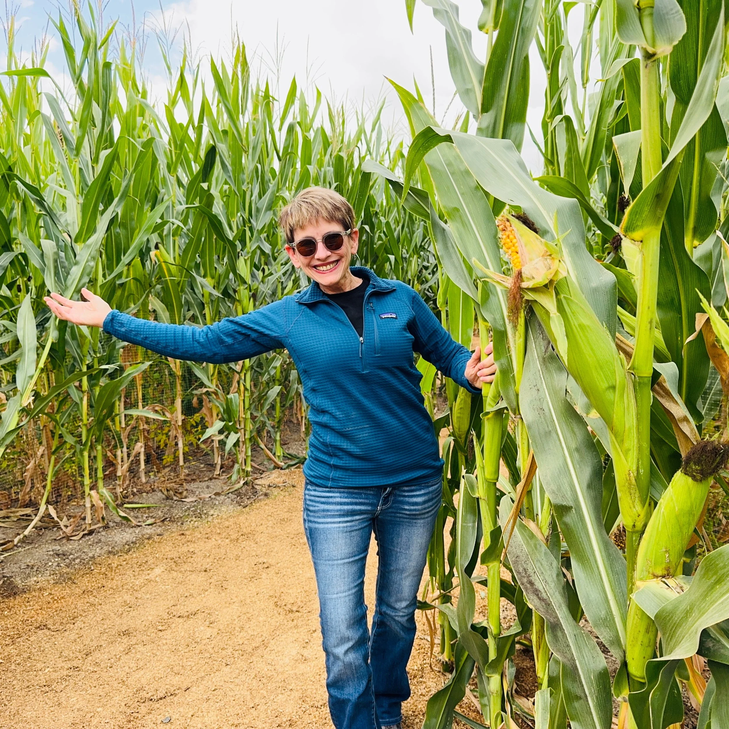 Breathing in the crisp fall air and gazing at the 12-foot corn stalks lining the soft path of wood shavings at my feet, I passed under a welcome banner wishing me good luck as I entered the eight acre Maize at the Pumpkin Patch on Sauvie Island, thin