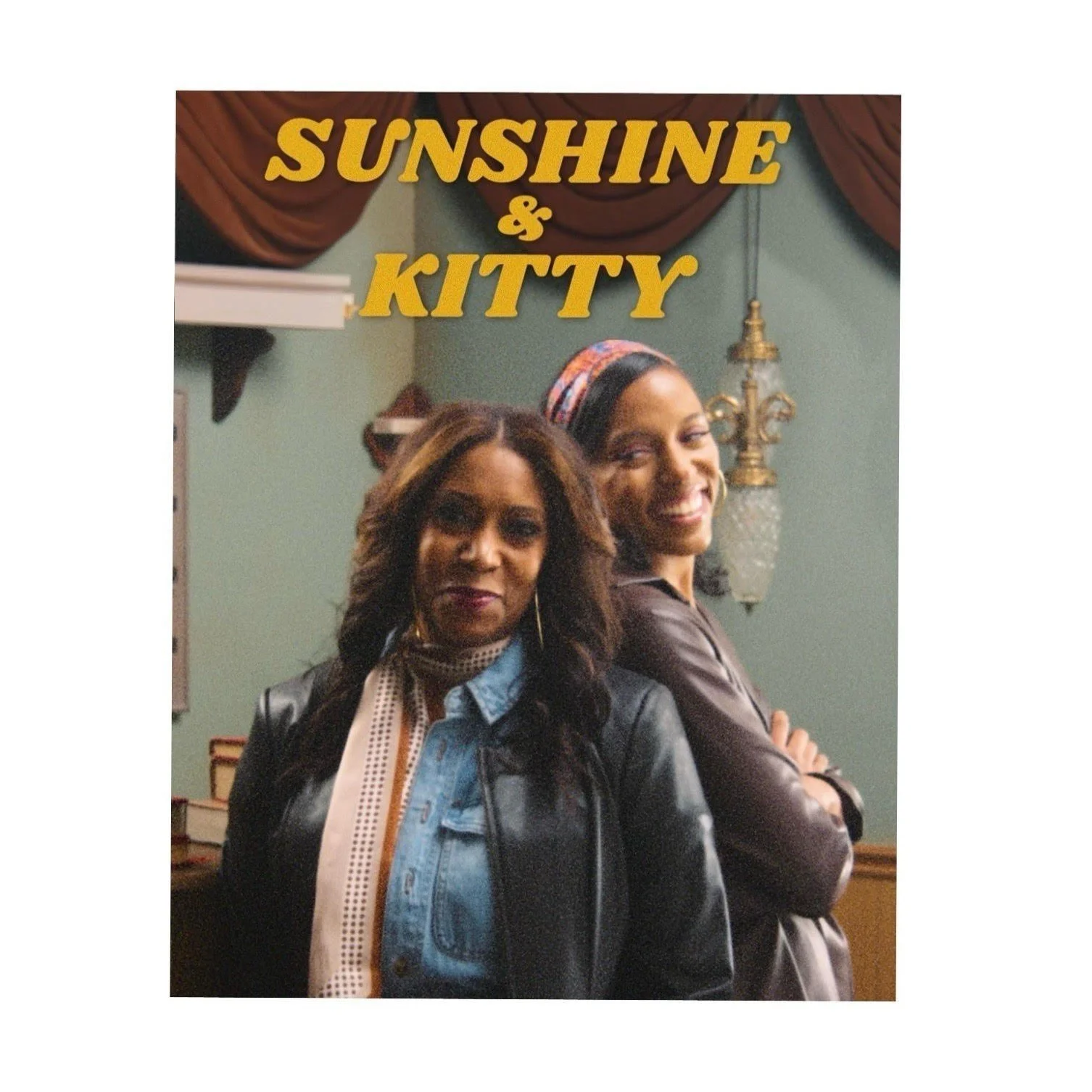 Two Black women styled in 1970's hair, makeup and clothing