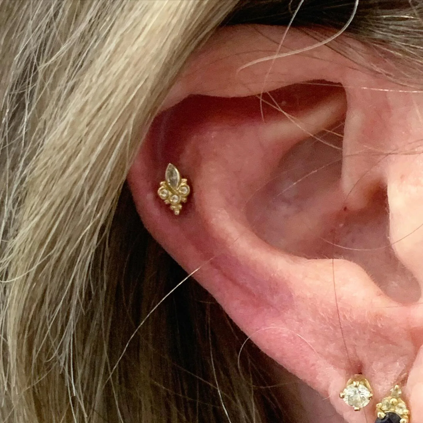 Check out this lovely piece from @bvla @brandolf_the_high installed at our Vintage faire location. Stop by and check out our awesome selection of body jewelry to add to your collection. 
#bodypiercing #earpeircing #14kgold #piercingstudio #profession