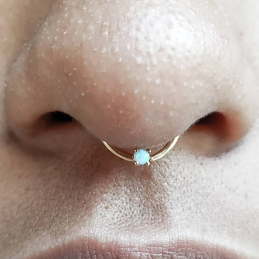 #14k #gold #septum w/ #opal .
.
.
.
.
#piercing #nose #yellow #bodypiercing #bodyjewlz