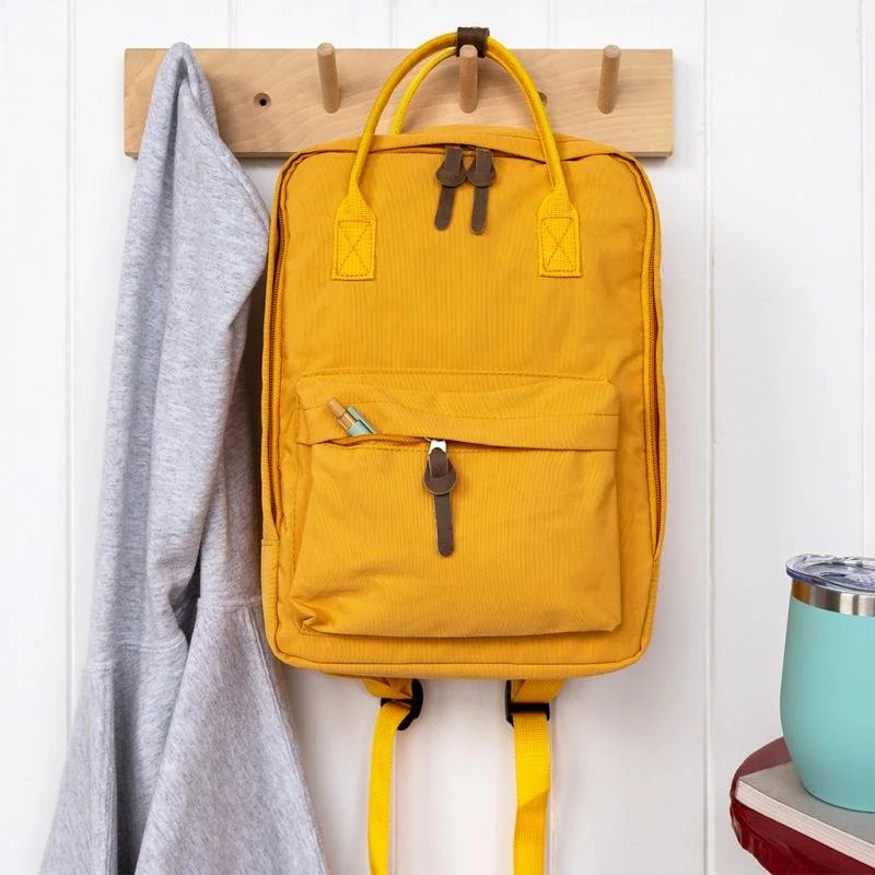 31101-compack-backpack-yellow_lifestyle.jpg