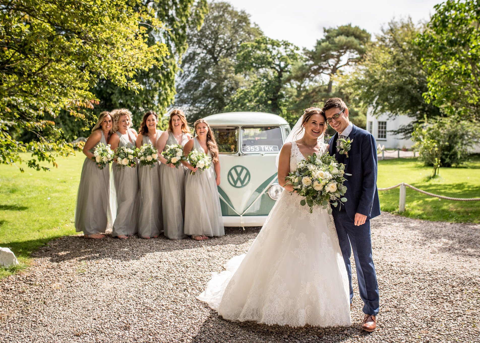 Couple bridesmaids and camper van in fron of Tall Johns House.jpg