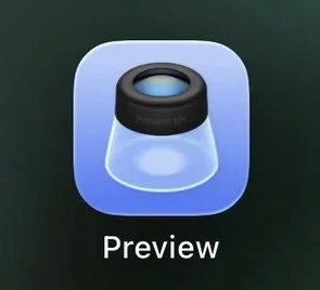 The official Apple Preview app icon featuring a magnifying glass loupe over a light blue background.