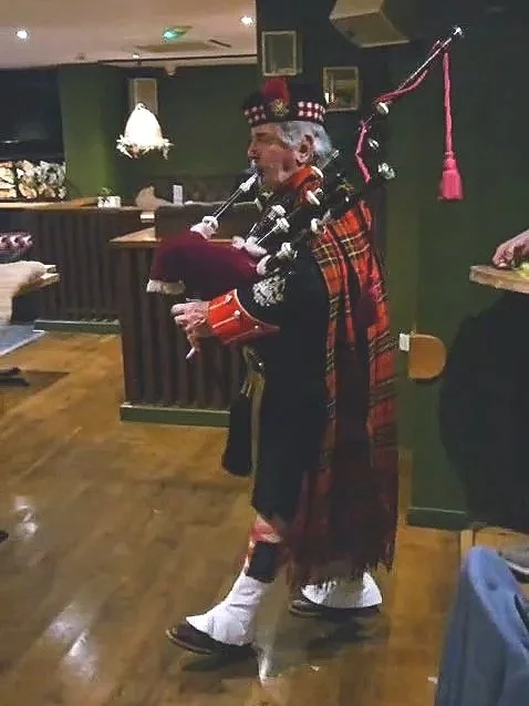 Haggis piped in by bagpipes at Christchurch Soho