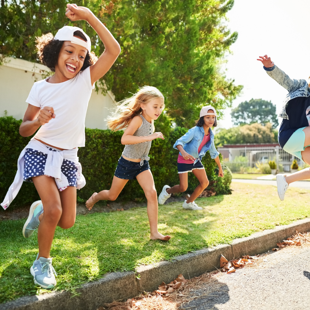 children running and jumping outside
