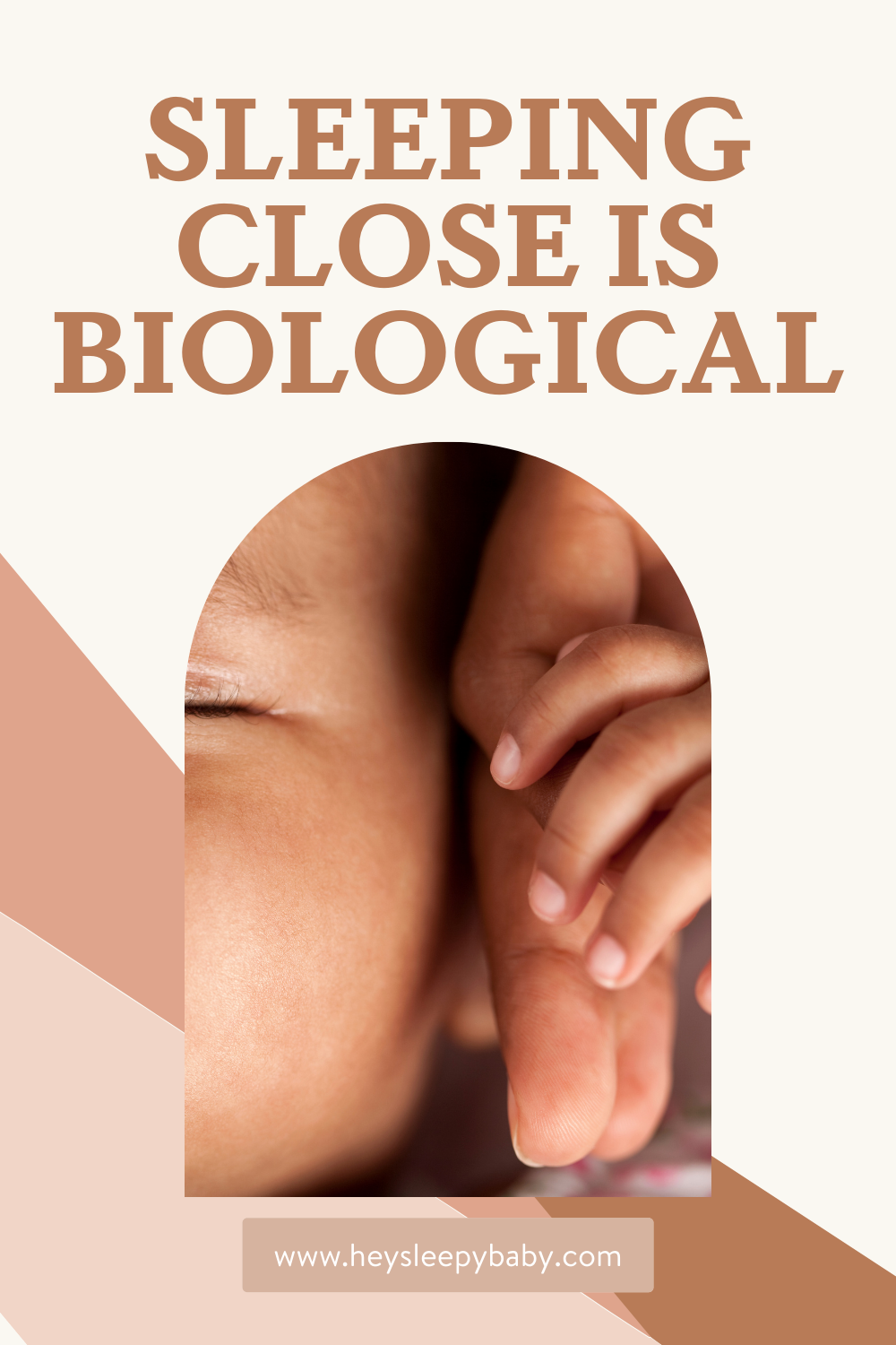 baby holding mom's hand