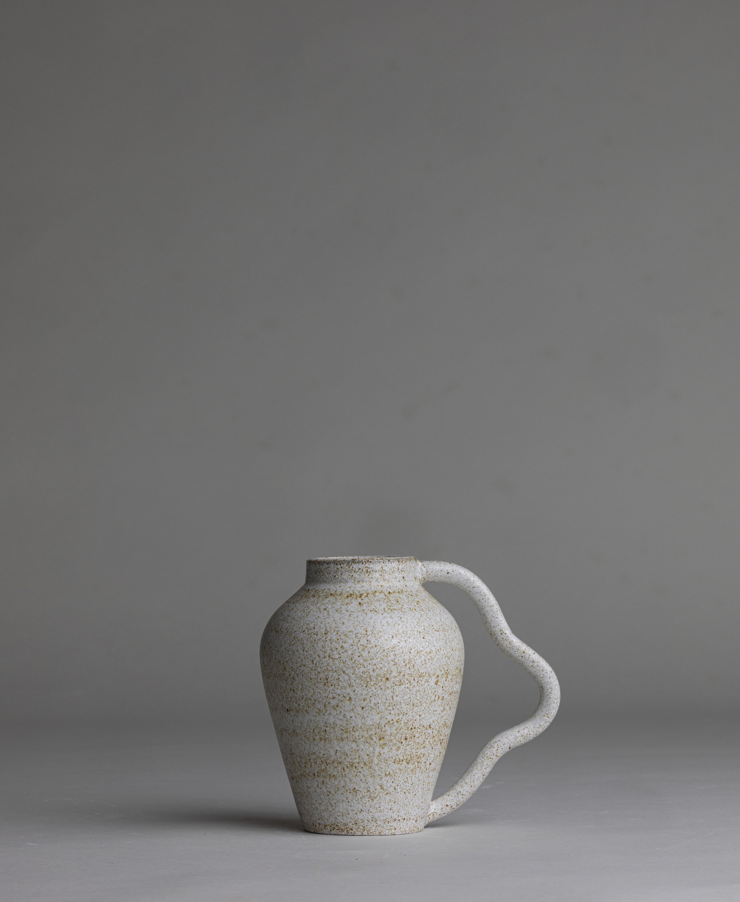 01. 
 small wavy handle vase  
$35 