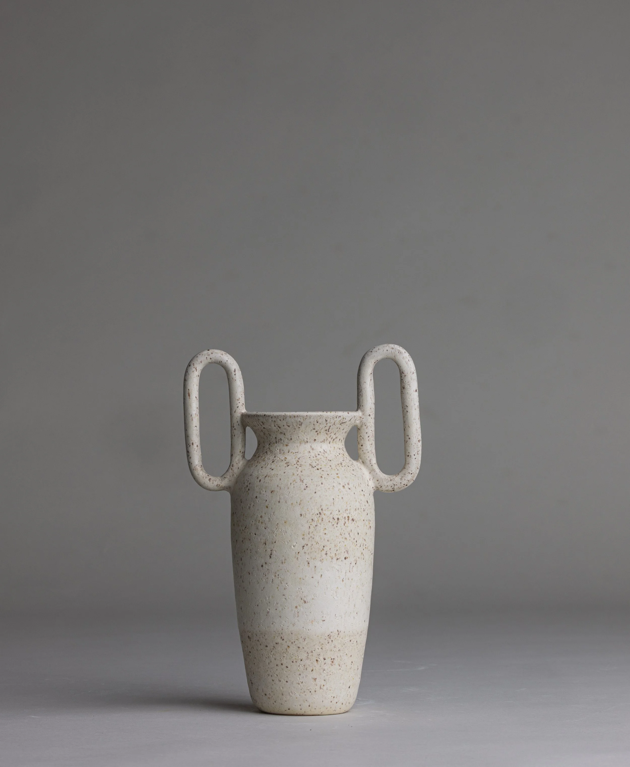 04. 
 small handle vase  
$40 
