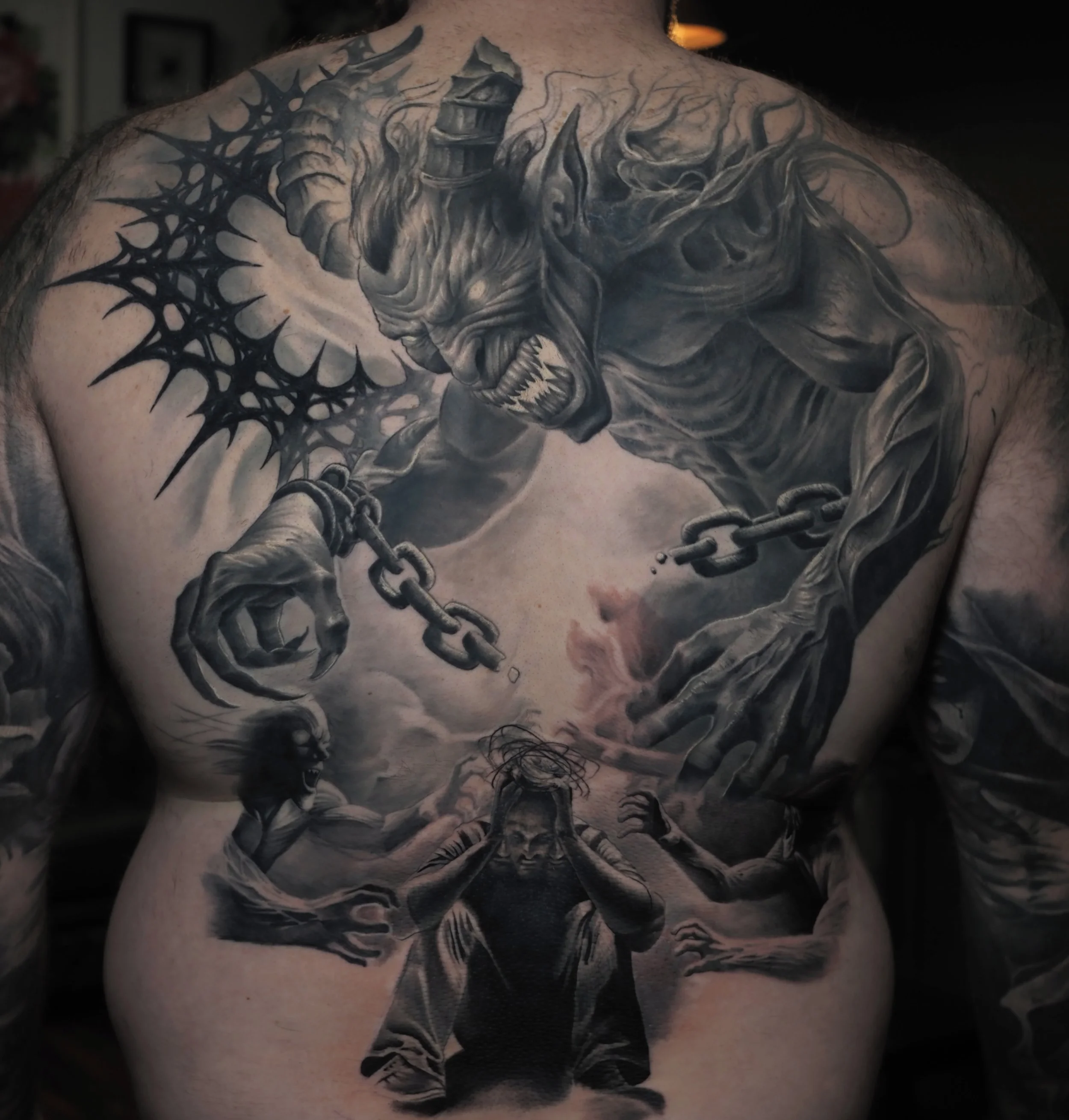 Chipping away at this massive back.