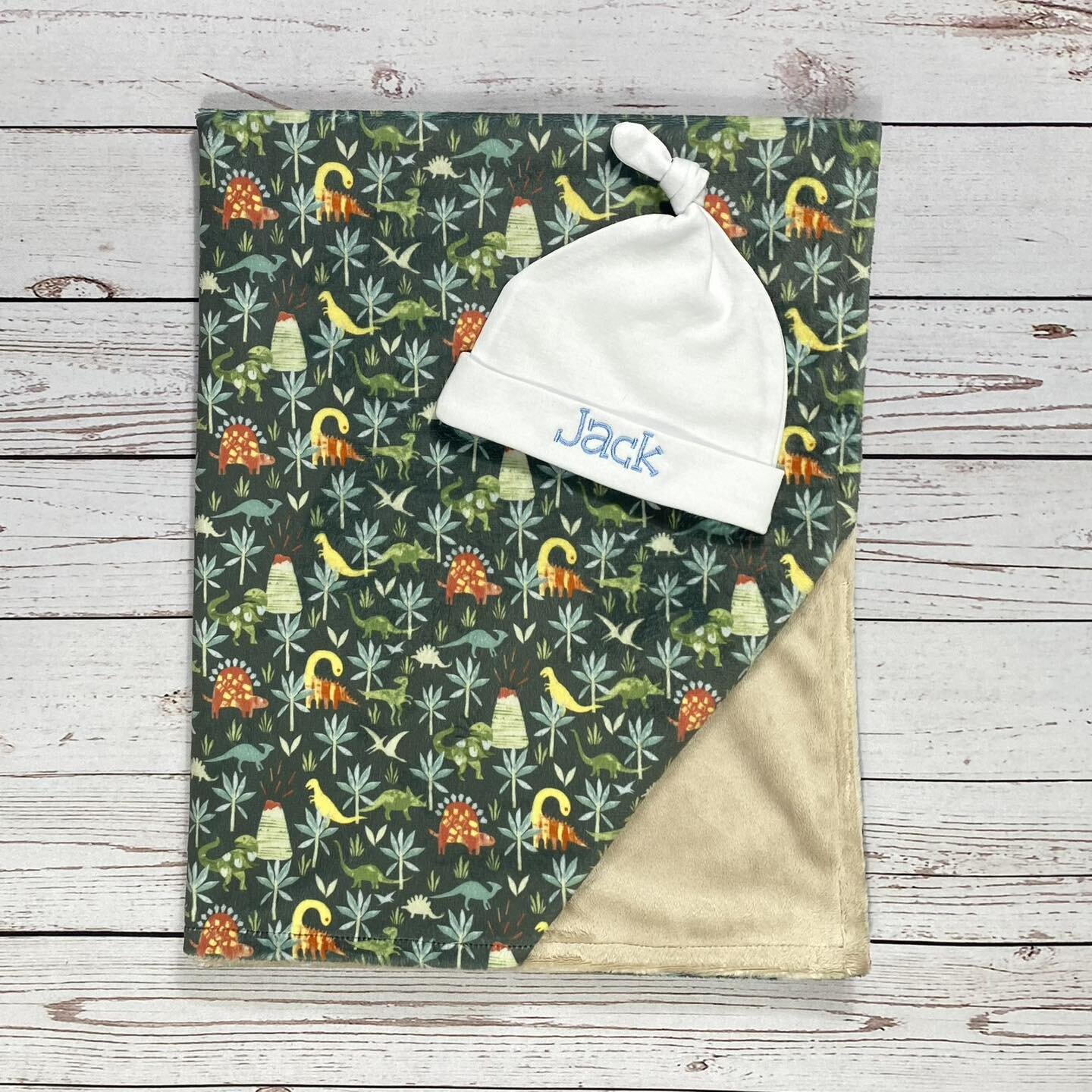 This minky blanket paired with a personalized hat make a DINO-mite gift set for a baby shower this Fall 🦕🦖 #sunnysidehaven #minkyblanket #newbabygift #babyboygiftideas #babyblanketsforsale #handmadeinpa #giftfromgrandma #giftfromnana