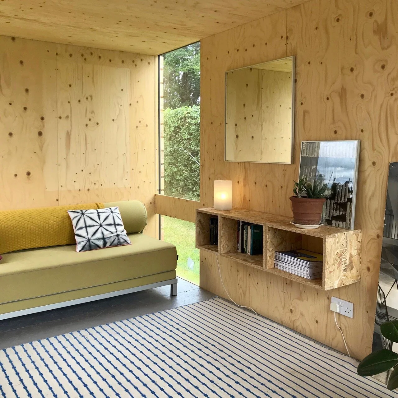 garden room interior plywood furniture and sofa