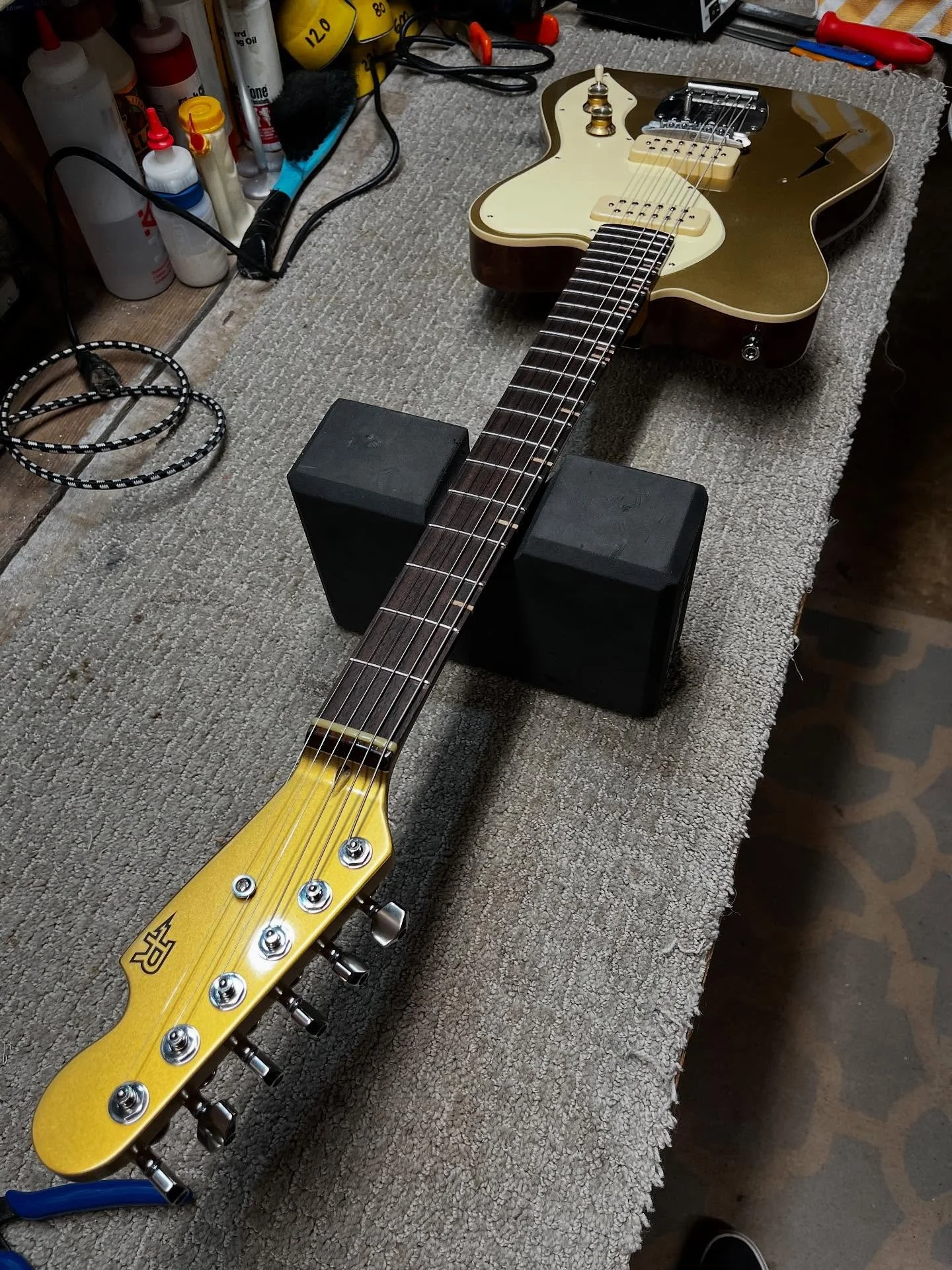More pics of No.38 as per request. 
Fleetwood Thinline
Semi-hollow Spanish Cedar body with solid maple top
Maple neck with Roaewood fretboard and maple inlays/side markers
Goldtop finish with matching headstock
Sperzell tuners
Unbleached bone nut
Mas