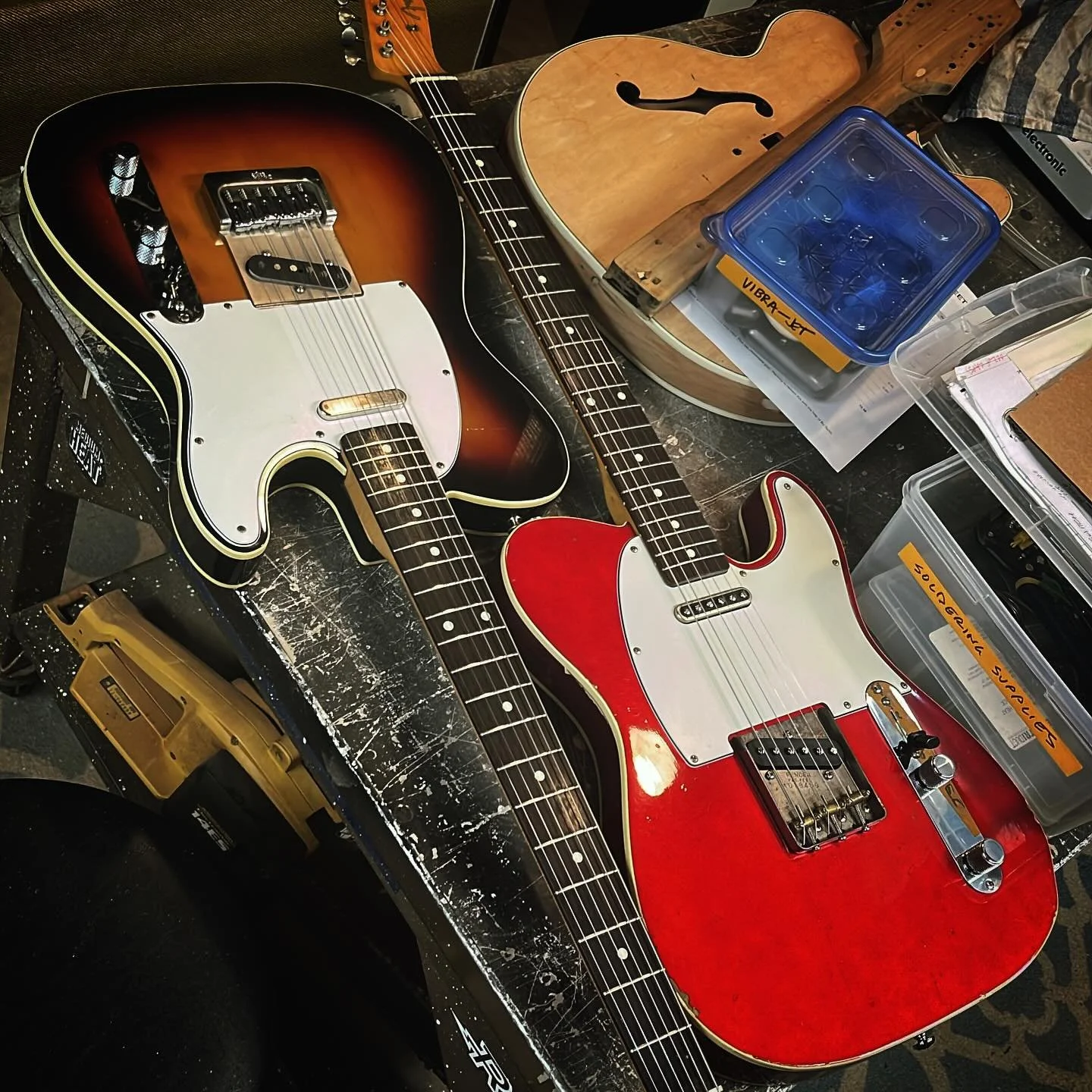 Not everyday that there are two MIJ 1980s Tele Customs in the shop, but this is one of those days. 

Sunburst Twlemis a customer guitar in for some fret work, pickup swap and complete re-wire. That bridge is a Double Eagle perhaps made by Leo Quan, i