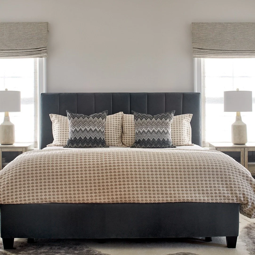 Warmth doesn’t always come from dark walls. In this primary bedroom, layered textiles and upholstered pieces bring depth and comfort—creating an inviting retreat for time spent indoors.
Photos by @mcbecks_pix 
#interiordesign #interiors