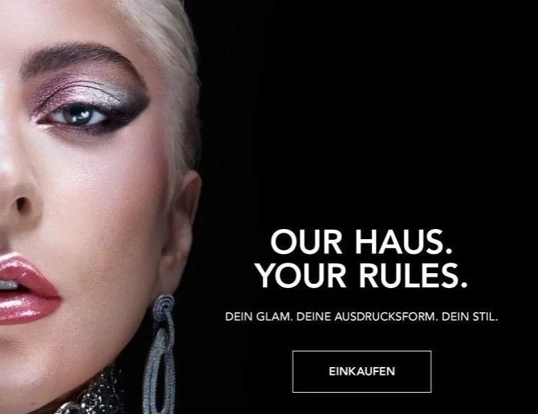 Close-up of a woman with platinum blonde hair, makeup including glossy lips, eyeshadow, and earrings, with text in German and English advertising a fashion or makeup brand.