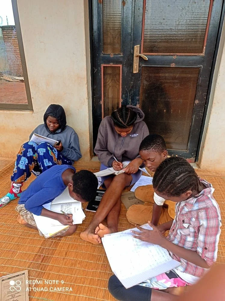 Lucia tutors neighborhood children.jpg