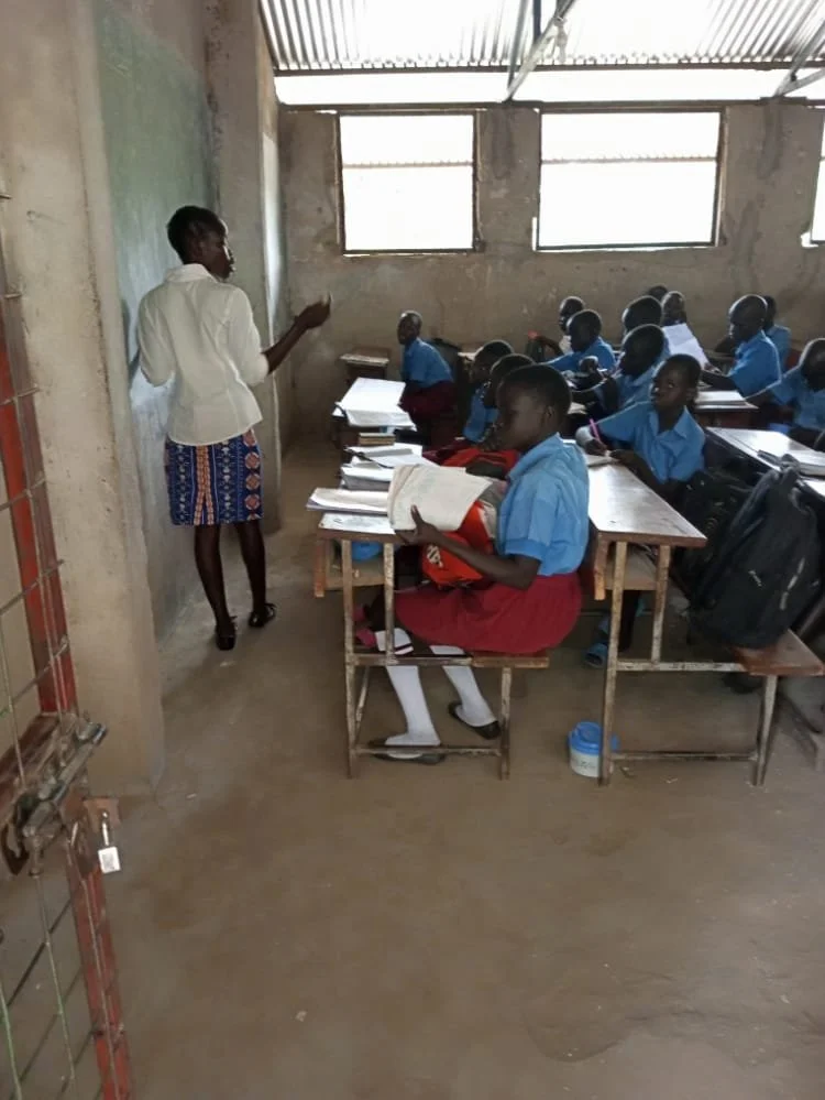 Jane Itwari teaches math.jpg