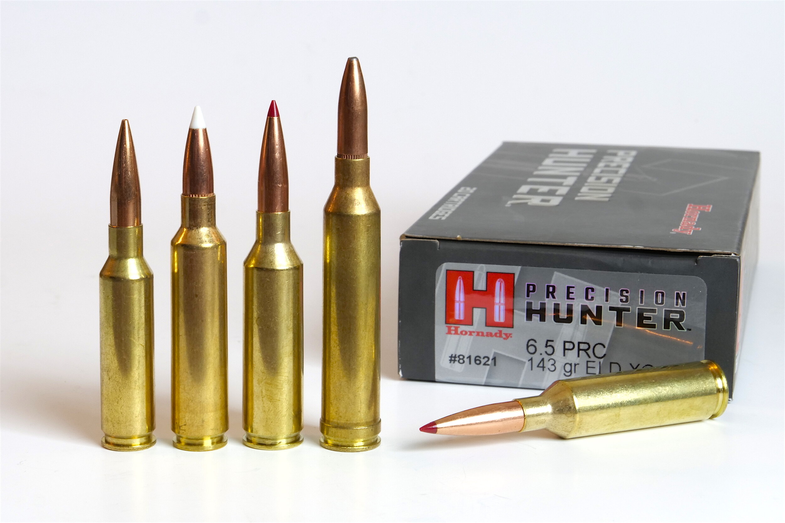 Picture shows the 6.5 PRC cartridge standing beside similar 6.5mm cartridge...