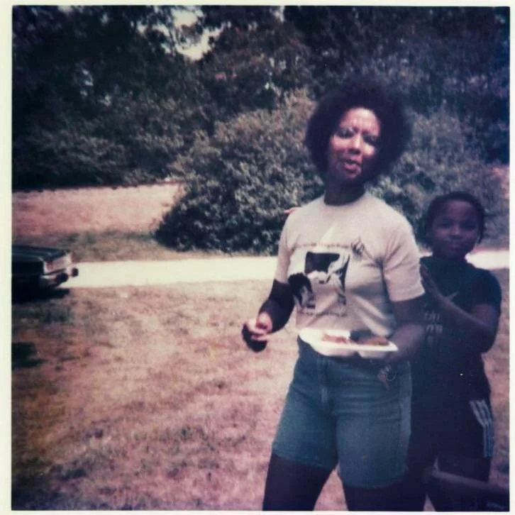 Standing behind mom.jpg