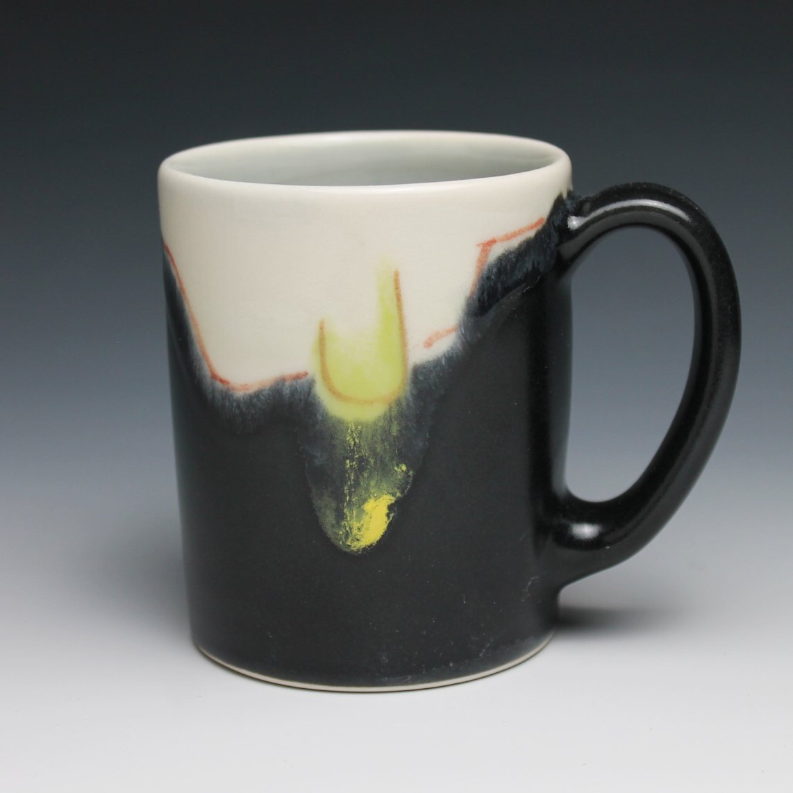 Presser mug with Deep Black and Emerald Green glaze. (3"x4"x3.75")