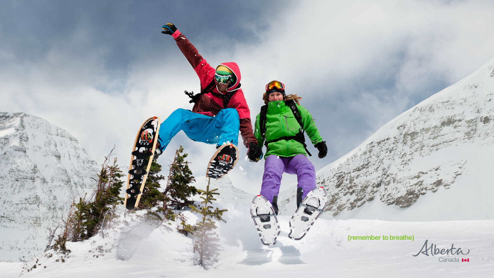 Remember-to-breathe-pyncher-snowshoe-jumping-couple.jpg