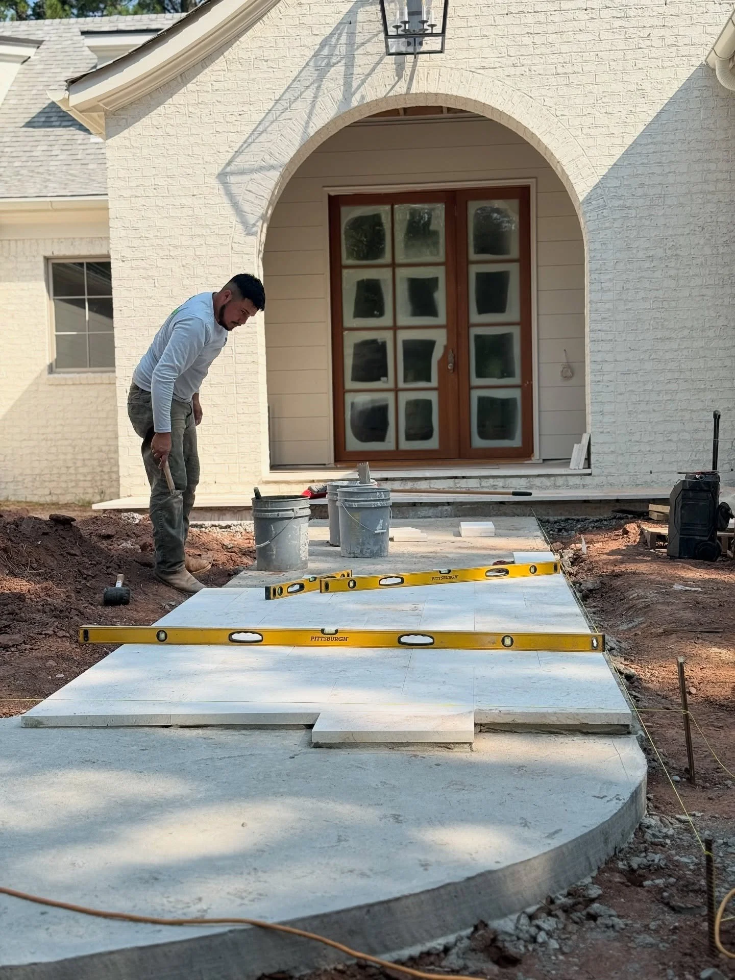 The custom masonry pathway is really starting to take shape! Next, we&rsquo;ll have the custom rain garden reveal.

Follow along to see more of this landscape transformation.

📷: @froggy_del_mar

#CustomHomeBuild #MasonryPathway #EcoFriendlyLandscap