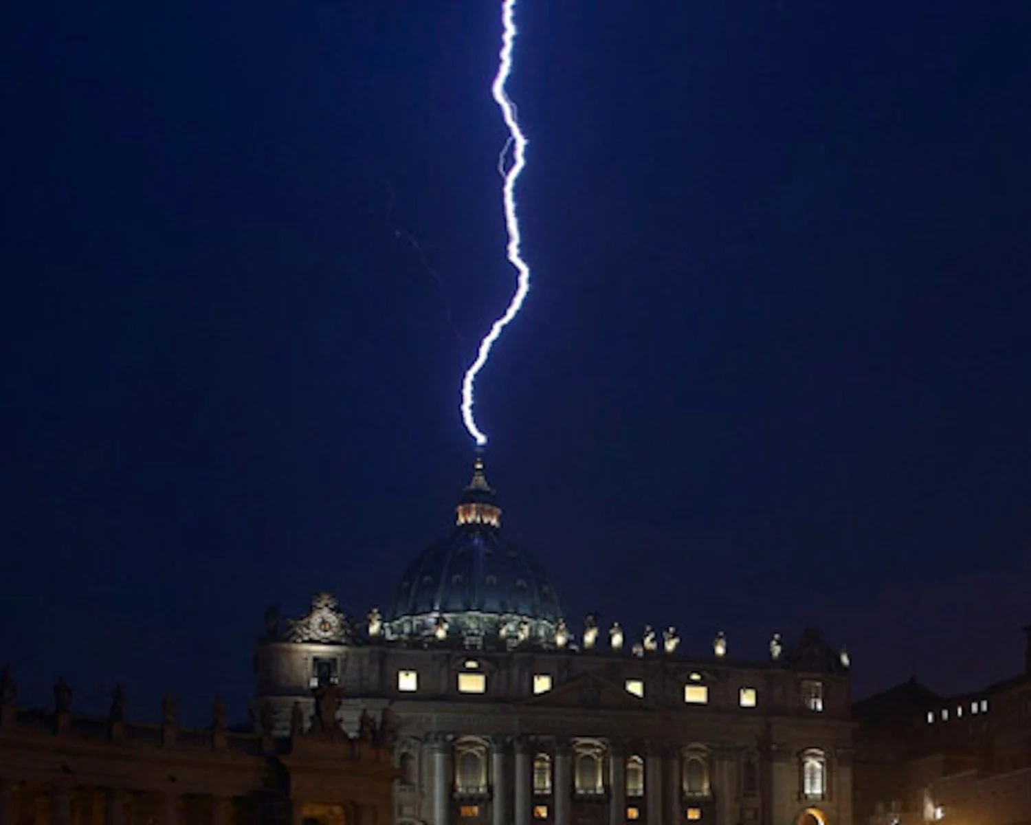 A lightning bolt strikes the dome of Saint Peter's at the Vatican.