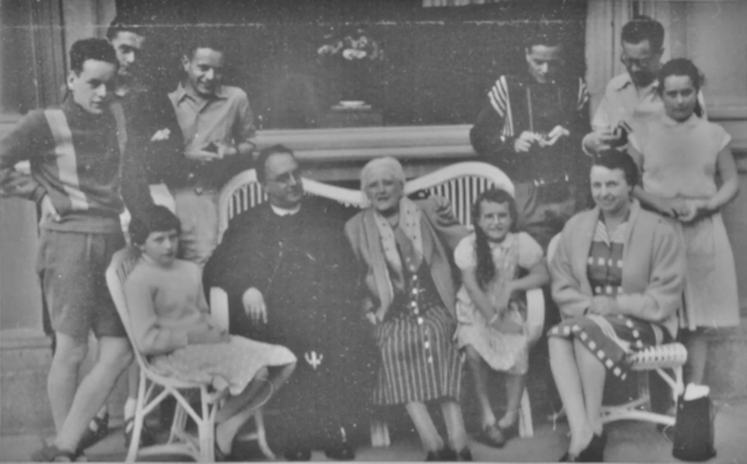 Young Pierre Matthews and his family with their friend Father Georges Lemaitre