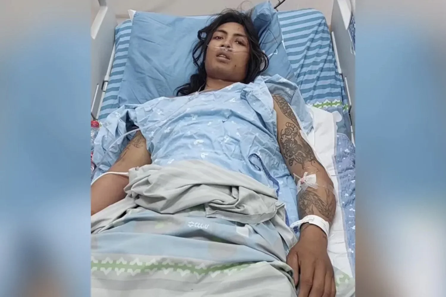 Mitchai Sarabon, Thai victim of Hamas on October 7, 2023, in his hospital bed in Tel Aviv.