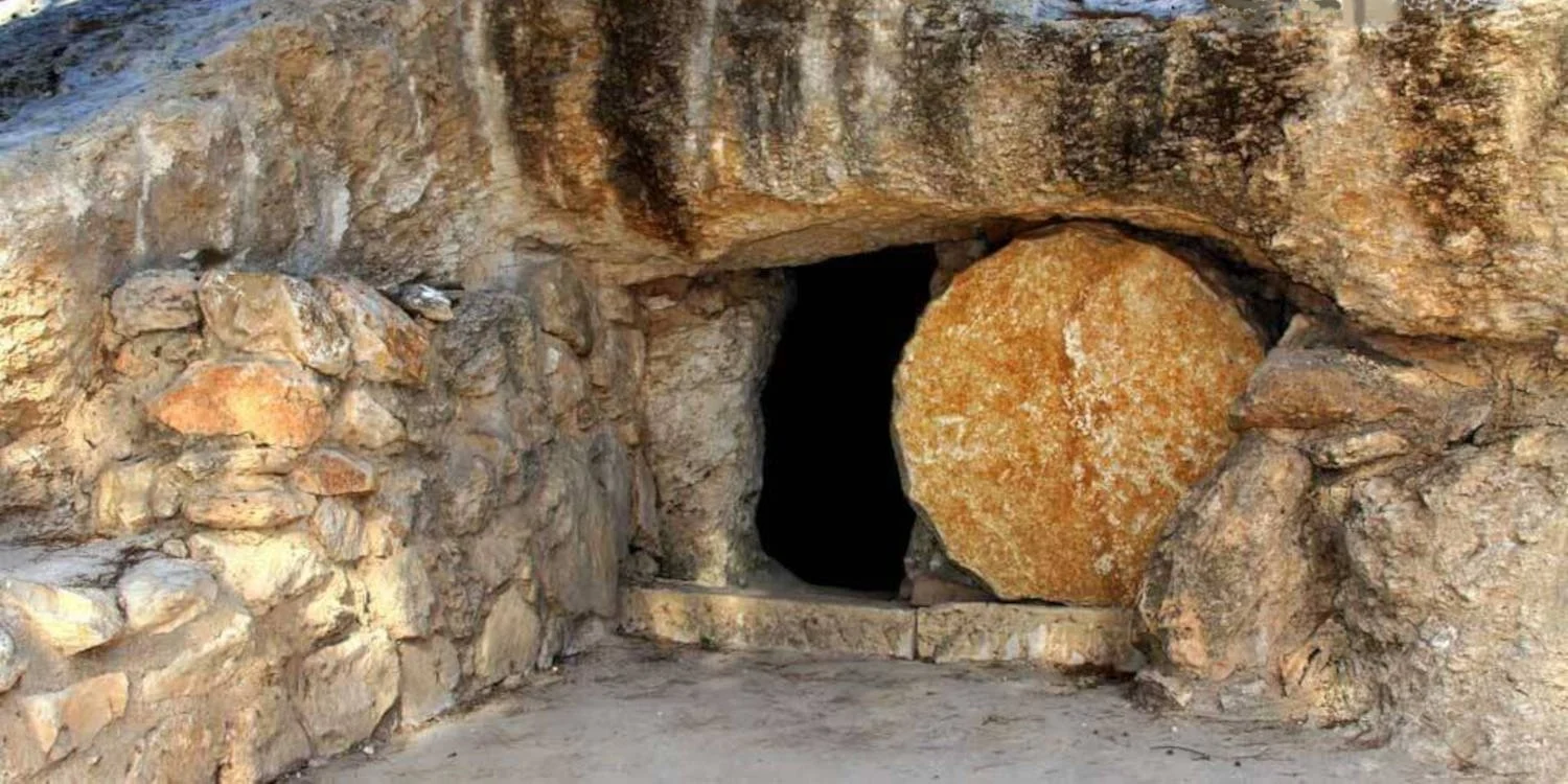An ancient Jewish burial tomb cut from a rock with the sealing stone rolled away