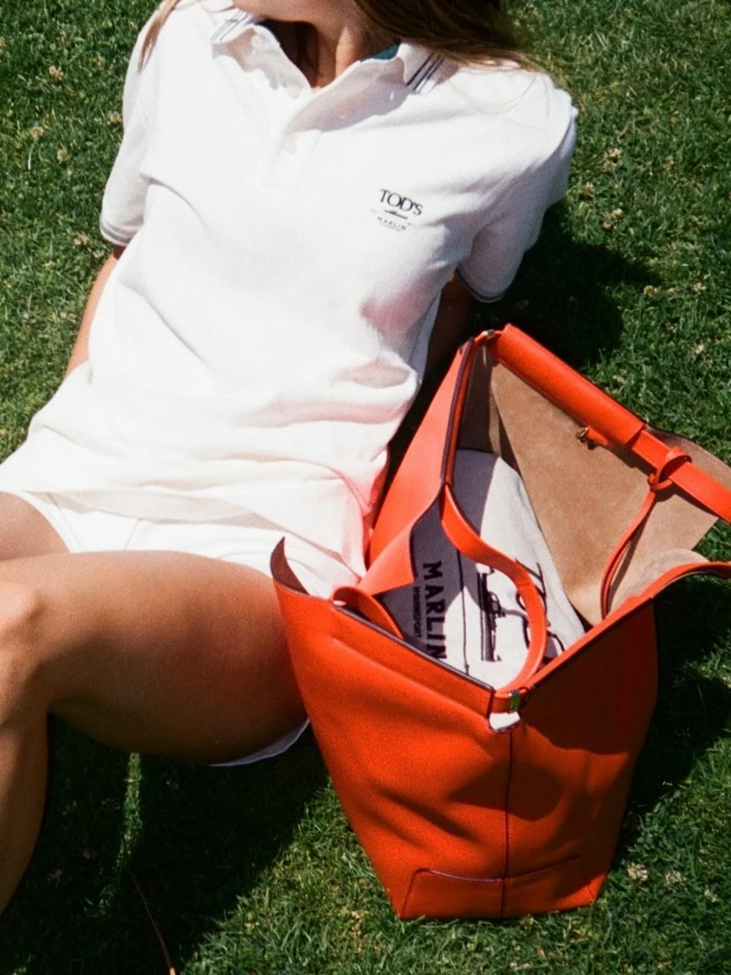 touching grass in @tods