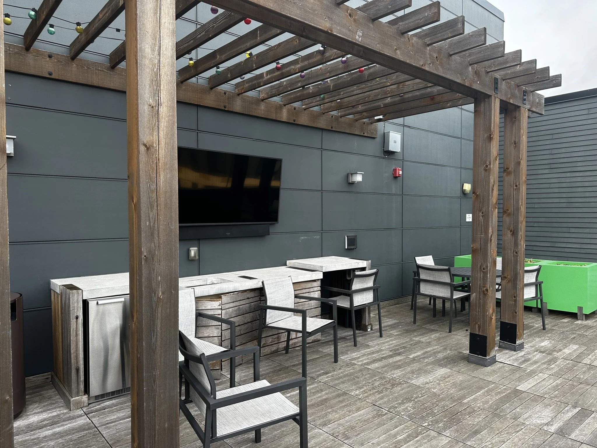 The chairs are a little messy , but this weatherproof smart tv made for a good shot of one of our installs. #weatherprooftv #outdoorentertainment